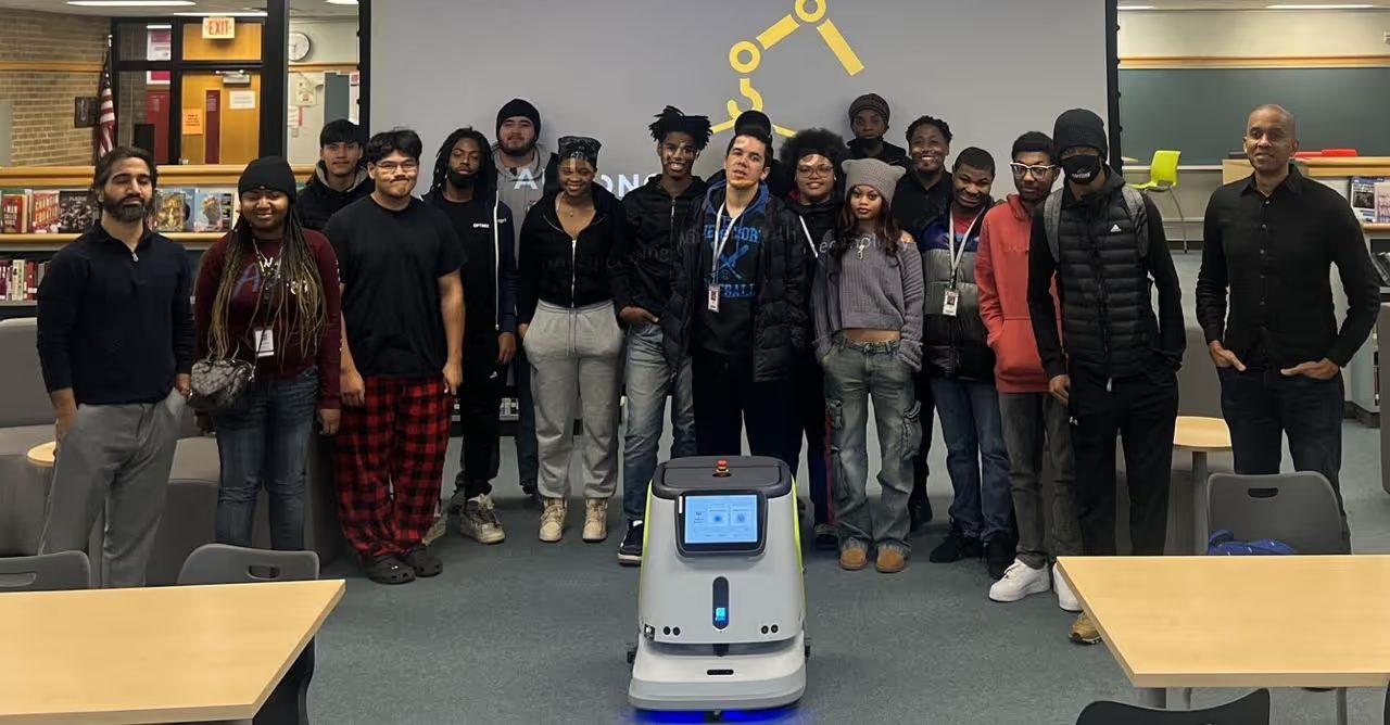 RoboSmart staff and facility team with a CC1 scrubber